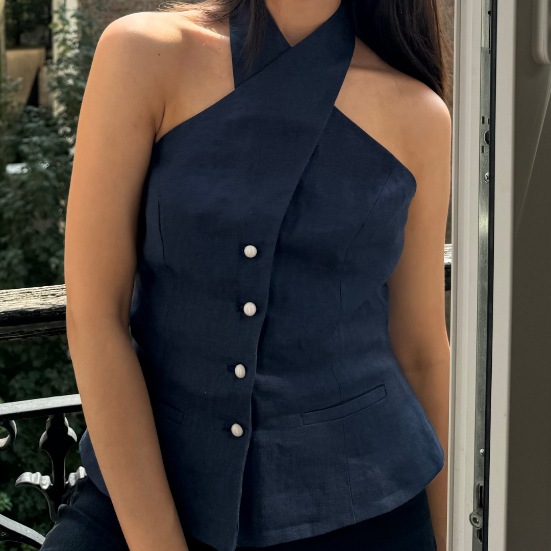 Navy Astrid Vest with twisted neckline and pearl buttons