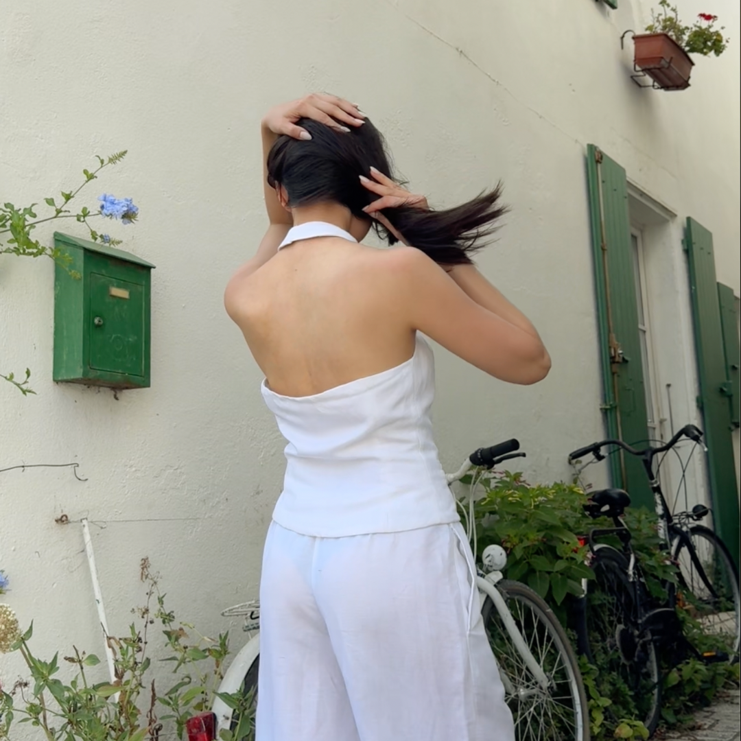 Back view of the white Astrid halter vest