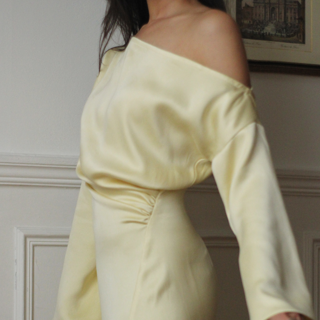 Side gathers on the yellow satin Bella Dress