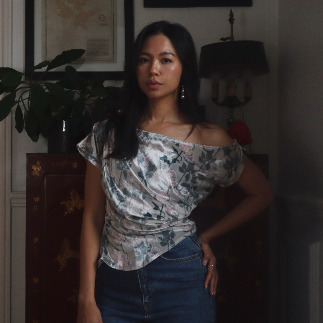 Bella off-shoulder top in printed satin worn with jeans