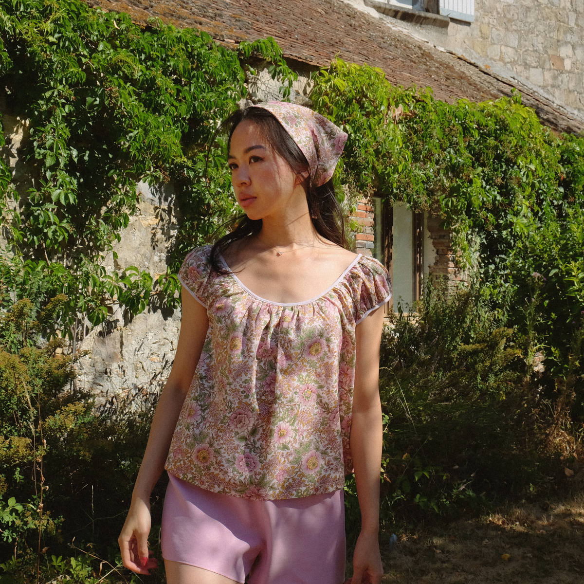 Pink floral Linnea Blouse with gathered cap sleeves