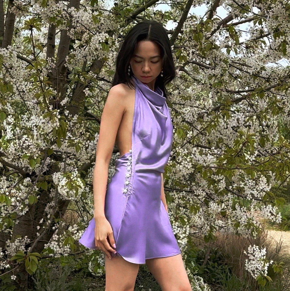 Lilac Sienna Dress under a blossoming tree